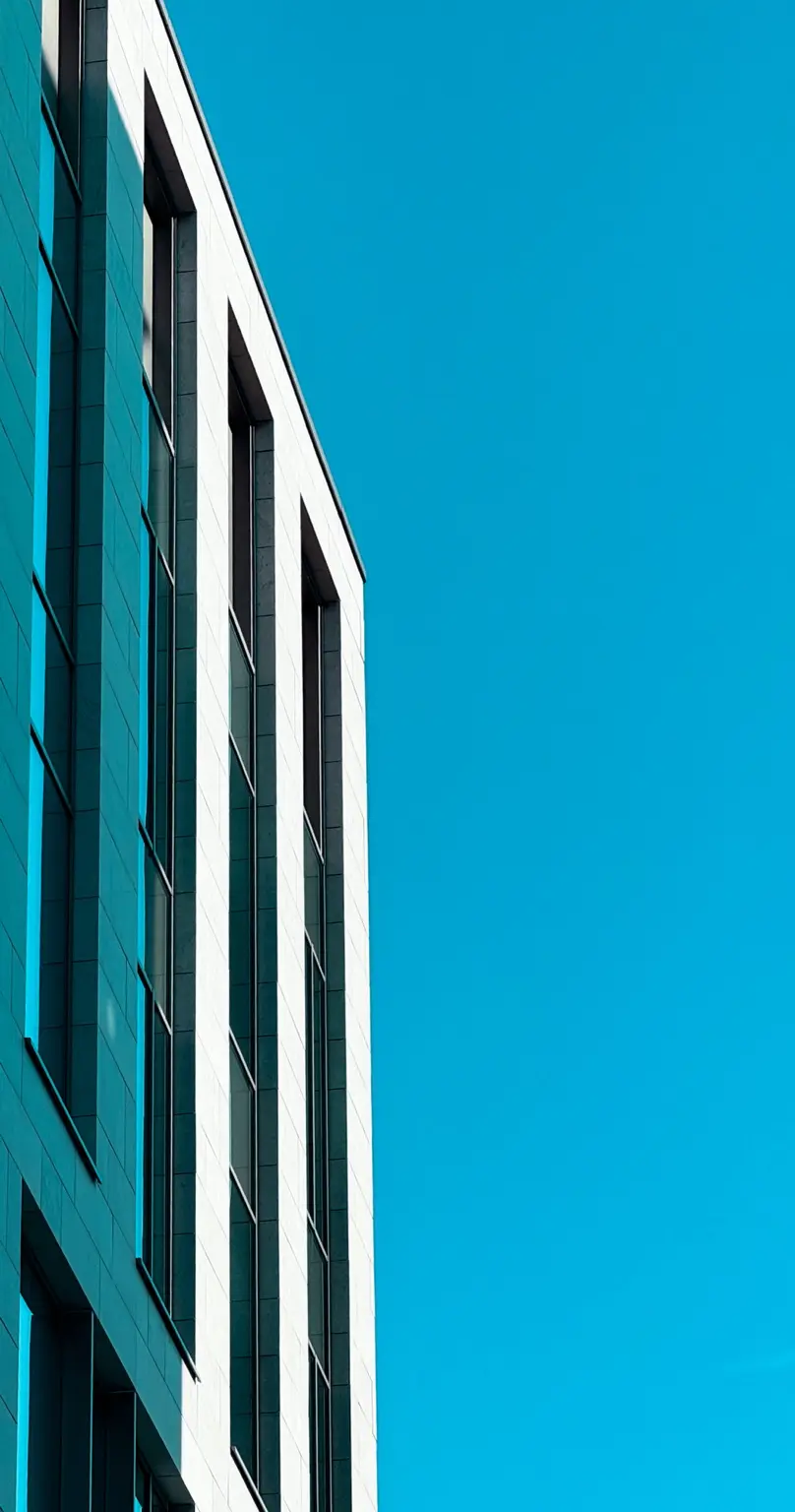 Minimal modern building against cyan sky